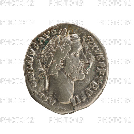 Denarius, Antoninus Pius (86–161; Roman emperor 138–161). Obverse: ANTONINVS AVG PIVS PP TR P XII — Emperor's head in a laurel wreath facing right. Pearl border. Reverse: Annona stands turned left; in her right hand she holds ears of corn above a modius, in her left hand an anchor. Pearl border. Iconography: busts, imperial busts, Annona (personification), ears of corn (attribute), modius (attribute), anchor (attribute). Date: 148–149. Roman Empire (27 BC–476). Rome. Coin. Weight: 3.10 g. Axis: 180°.