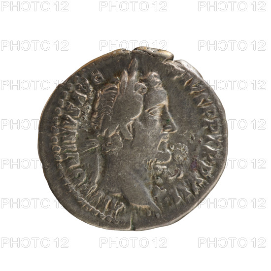 Denarius, Antoninus Pius (86–161; Roman Emperor 138–161). Silver coin, weight 3.15 g, axis 180°. Obverse: ANTONINVS AVG PIVS PP TR P XII — emperor's head in a laurel wreath facing right. Pearl border. Reverse: C O S I I I — Annona stands facing left, holding ears of corn above a modius in her right hand and an anchor in her left. Pearl border. Date ca. 148–149, Roman Empire (27 BC–476), Rome.