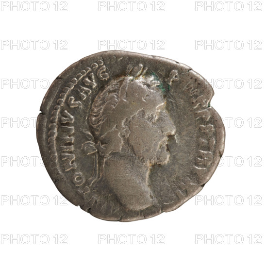 Denarius of Antoninus Pius (86–161; Roman emperor 138–161). Obverse: ANTONINVS AVG PIVS PP TR P XII — emperor's head in a laurel wreath right; pearl border. Reverse: C O S I I I I — naked genius (Bonus Eventus) stands turned left, holding a patera in his right hand and ears of corn in his left; pearl border. Date: 148–149. Material: Roman coin; weight 3.34 g; axis 180°.
