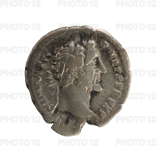denarius, Antoninus Pius (86–161; Roman emperor 138–161) — iconography: Annona (personification) with ears of corn and modius; imperial bust. Obv. ANTONINVS AVG PIVS PP TR P XVI — Emperor's head in a laurel wreath facing right. Pearl border. Rv. COS — Annona stands facing left, holding ears of corn in her right hand lowered, left hand rests on a modius standing on a ship (only half visible). Roman, 152–153 CE. Silver coin (denarius), weight 3.29 g, axis 180°.