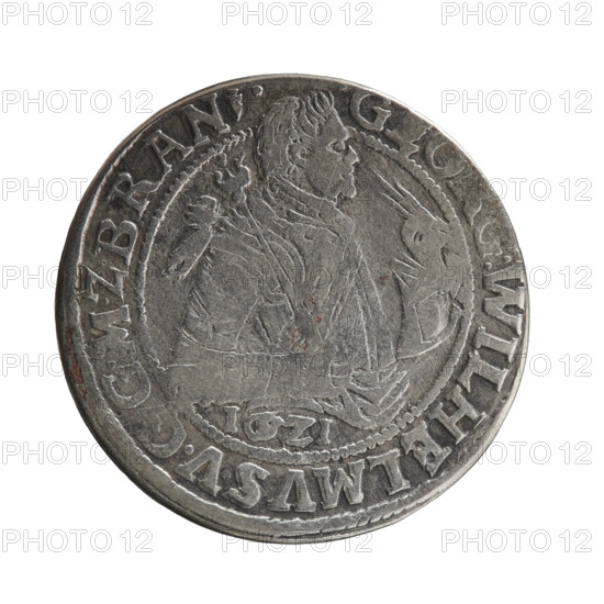 Obv. A bust in armor turned right, girded with a sash. A sceptre in his right hand. In front of the bust, on the right side in the coin field, a helmet with a plume. Below the date numeral I, ZI. The figure's head divides the inner border. On the rim between the borders, an inscription ending with a heart: .GEORG:WILHELMVSV., GMZBRAN. Rev. Under the ducal mitre, a five-field coat of arms shield with ornaments. On the rim between the borders an inscription divided by a mitre and ending with a heart: DHRRERT.CVCHVR., .IPZGC.BH, 1621. Subject: George William Hohenzollern (Elector of Brandenburg; Duke of Prussia; 1620–1640). Place and date: Ducal Prussia, Königsberg, 1621. Object: coin; diameter 29.7 mm; weight 7.62 g; axis 120 degrees. Materials/style: coats of arms, male bust in armor, ducal mitre.