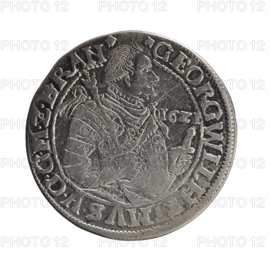 Obv.: Bust turned to the right in decorative armor girded with a sash. Right hand holds a sceptre, left rests on a sword hilt. Head divides the inner border. Date numerals I6ZI. Rim between borders inscription: +GEORG WILHELMVS.VGGMZBRAN+ . Rev.: Under the ducal mitre a five-field coat of arms shield with ornaments. Rim between borders inscription divided by a mitre and ending with a heart +DHRRERT.CVCVCHVRF.IPZGCBH. 1621. Ducal Prussia (1525–1701), Königsberg. Coin: diameter 29.6 mm, weight 6.73 g, axis 90°.