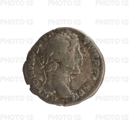 Denarius of Antoninus Pius (86–161; Roman emperor 138–161). Obverse: Emperor's head in a laurel wreath facing right; legend 'ANTONINVS AVG PIVS PP IMP II'. Pearl border. Reverse: Annona standing facing left, holding ears of corn above a modius in her right hand and a rudder resting on a ship's prow in her left; beaded border; legend 'TR POT XXI C OS IIII'. Hoard find (Golub). Attributes: Annona (personification), rudder, modius, ears of corn; imperial bust. Date: 157–158. Roman Empire (27 BC–476). Rome. Coin; weight 2.90 g; axis 180°.