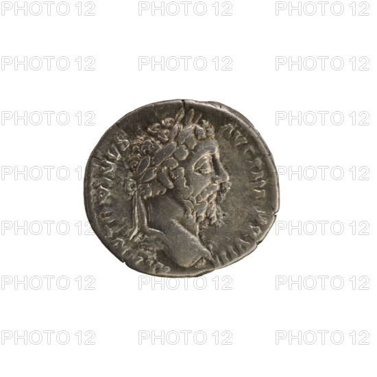 Denarius of Marcus Aurelius (121–180; Roman emperor 161–180), 173–174 CE. Obverse: Head of Marcus Aurelius with a laurel wreath, right; legend M ANTONINVS AVG TR P XXVIII; beaded border. Reverse: Germanic sitting at the feet of a trophy, facing left; legend IMP VI CO SIII; pearl border. Roman coin, Rome; weight 3.48 g; axis 180°.