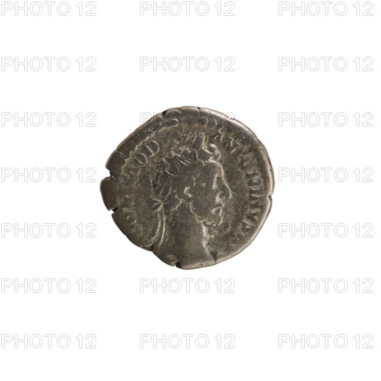 Denarius of Commodus (161–192; Roman emperor 177–192). Obverse: Emperor's head right, wearing a laurel wreath; legend 'COMMOD ANTONINVS A' (pearl border). Reverse: Prisoners seated at the feet of a trophy; legend 'TR PV IMP I, COS II P' (pearl border). Roman Empire, 180. Coin, Rome; weight 3.05 g; axis 180°.