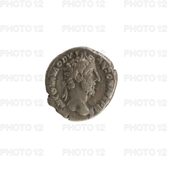 Denarius, Commodus (161–192 CE), 183–184 CE. Obverse: M COMMODVS ANTON AVG PIVS — Emperor's head right, laurel wreath; pearl border. Reverse: PM TR P VIIII IMP VI COS IIII PP — Mars in military garb facing right, spear raised in right hand, resting on a shield; pearl border. Silver coin, weight 3.60 g. Roman Empire (Rome). Iconography: Commodus; Mars; shield and spear attributes; imperial bust.