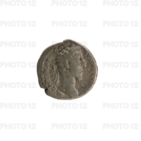 Denarius, Commodus (161–192; Roman emperor 177–192). Obverse: Emperor's head right, laurel wreath; pearl border; legend 'M COMM AN O' (partially). Reverse: Mars in military attire and helmet facing right, holding a spear vertically in his right hand and resting on a shield; legend 'PM TR P VIIII IMP VII COS IIII PP' (poorly legible). Subject: imperial busts; iconography: Commodus and Mars; attributes: shield, spear. Hoard find: Golub. Date: 184. Culture: Roman Empire (27 BC–476). Place: Rome. Object type: coin (denarius). Weight: 3.30 g.