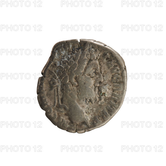 Denarius of Commodus (161–192; Roman emperor 177–192). Obverse: Emperor's head right, wearing a laurel wreath; pearl border; inscribed 'M CO, FE L AVG BRIT PP'. Reverse: Minerva standing facing left, holding Victoria in her right hand and a spear in her left, shield in front, trophy behind; pearl border; inscribed 'MIN VICT PM TR P, ES VI'. Roman Empire, 2.50 g, Rome.