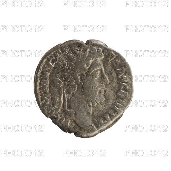 Denarius of Commodus (reigned 177–192 CE), Roman Empire, struck 190–191 CE. Obverse: laureate, draped, cuirassed imperial bust of Commodus right; legend OMM ANT P EL AVG BR (partially legible). Reverse: Concordia standing left, holding a patera in her raised right hand and a scepter in her left; legend CONC COM RP XVI COS VI (hardly legible). Hoard find from Golub indicated; associated iconography: busts, patera, sceptre. Material: silver coin; weight 2.75 g.