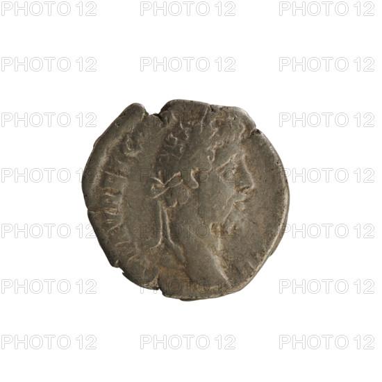 Denarius of Commodus (reign 177–192). Obverse: emperor's head right, wearing a laurel wreath, inscription EL AVREL C. Reverse: Serapis facing left, wearing a radiant crown, holding a branch and a scepter, inscription SERV AVG. Pearl border. Silver coin; weight 3.23 g; dated 191–192. Attributes/subjects: Commodus; Serapis; imperial bust; sceptre; branch. Hoard find: Golub (numismatic). Roman Empire (27 BC–476).