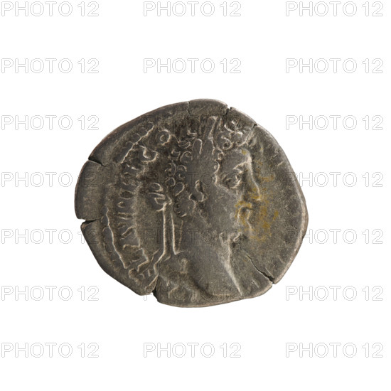 Denarius of Commodus (reigned 177–192). Obverse: Laureate bust of the emperor right; inscription L AEL AVREL CO; pearled border. Reverse: Victoria striding left, holding a wreath in her right hand and a palm in her left; star in right field; inscription M TR P XVII IMP VIII COS VII PP; pearled border. Roman Empire, AD 192. Silver coin, weight 2.76 g. Attributes: laurel wreath, palm branches.