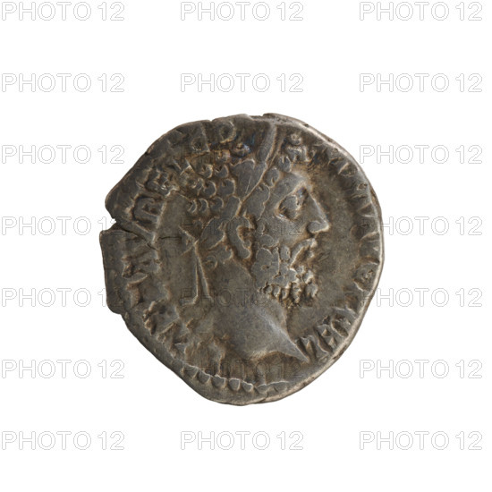 Denarius, Commodus (161–192; Roman emperor 177–192). Obverse: Emperor's head right, laurel wreath; legend L AEL AVREL CO MM AVG P FEL; pearly border. Reverse: Victoria striding left with wreath in right hand and palm in left; star in left field; legend PM TR P XV II IMP VIII COS VII PP; pearl border. Imperial bust iconography; laurel wreath and palm attributes. Treasure (numism.), imperial busts. Date: 192. Place: Rome, Roman Empire (27 BC–476). Coin, weight 3.44 g, axis 180°.