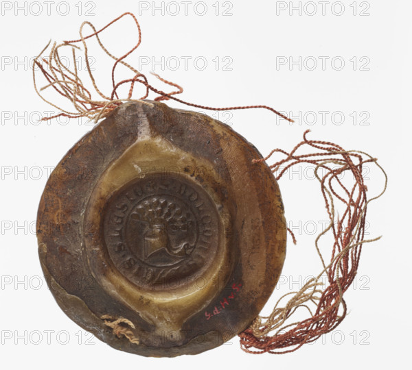 Round wax seal of Bolko II the Little (Duke of Jawor-Swidnica, 1326–1368). On-foot wax seal with countersigillum: a knight in armor and a cloak, standing with his head turned to the right, wearing a pot helmet with a jewel in the shape of a plume of peacock feathers. In his right hand he holds a sword turned upwards; in his left a shield with an eagle. On either side of the prince are two slender turrets with pointed roofs topped with a ball. Around the rim the inscription: + S. BOLCONIS. D, S. SLE. ET. DNI. DE. FVRSTEBHG. Round chancellery seal impressed on the reverse of the main seal (contrasigillum): in the central field, a pot helmet with labras and a jewel in the form of a peacock feather plume; in the rim the inscription: + S. BOLCONIS. DVCIS. SLESIE. Seal diameter 77 mm.