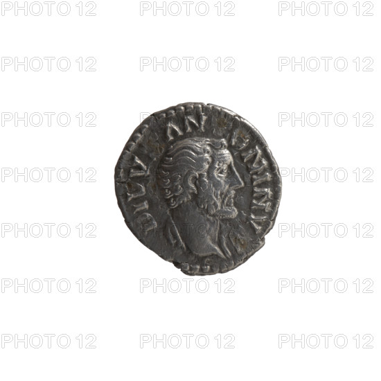 Denarius, posthumous issue after 161 CE. Obverse: head of Antoninus Pius, bare, drapery on left shoulder; inscription DIVV AN ONINV (all around). Reverse: Column of Antoninus Pius with statue of the emperor holding a scepter and an eagle; inscription DIVO PIO (all around). Issuers: Lucius Verus and Marcus Aurelius. Roman Empire, Rome. Coin: diameter 17.0–17.5 mm, weight 3.17 g, axis 165°.