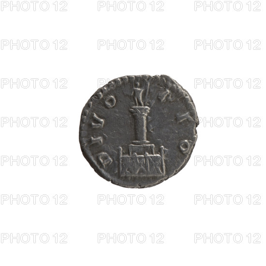 Denarius, after 161 CE. Obverse: head of Antoninus Pius without a covering, with drapery on the left shoulder, right; inscription DIVV AN ONINV all around. Reverse: Column with a statue of Antoninus Pius holding a scepter and an eagle, inscription DIVO PIO all around. Issuers: Lucius Verus and Marcus Aurelius (posthumous for Antoninus Pius). Roman Empire (27 BC–476), Rome. Coin: silver; diameter 17.0–17.5 mm; weight 3.17 g; axis 165°.