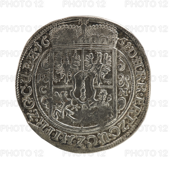 Obv. Bust facing right in mitre and electoral mantle. In the right hand a sceptre, the left rests on a sword hilt. The sword guard and the figure's head divide the inner border. In the rim between the borders is the inscription FRID.WILH.VGGMARG.Z.BRANDENBU. Rev. Below the ducal mitre, a five-field coat of arms with ornaments. On both sides of the shield numerals of the values .1 - 8. Below, on both sides of the shield the mintmaster's mark D - K. In the rim between the borders an inscription divided by a mitre DHRRERTZC.UCZMIPR.ZGCU. BH16-56, 1656. Ducal Prussia (1525–1701), Königsberg. Coin: diameter 31.2 mm, weight 6.87 g, axis 0°.