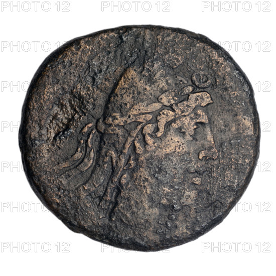 Bronze coin from Gorgippia (Cimmerian Bosporus), 1st quarter of the 1st century BC (95–65 BC according to Frolov). Obverse: head of Attys in a Phrygian cap decorated with stars and wearing a laurel wreath, facing right; a crescent and star at the top. Reverse: Dionysus in a short robe standing three-quarters to the left, holding a bunch of grapes in his right hand; a thyrsus with a ribbon in the left field; a panther seated to the left at Dionysus's feet with its head turned; a monogram in the right field; inscription in two rows on the sides. Iconography: Attys, Dionysus, panthers, crescent with star, male head, monograms. Coin type: bronze; weight 16.90 g; diameter ~28.1–30 mm.