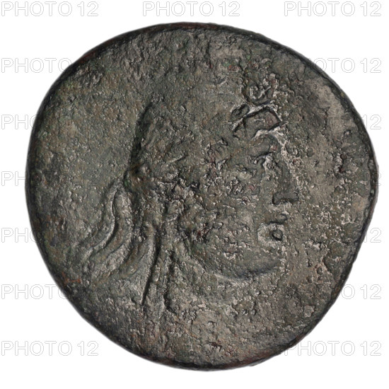 bronze coin, Gorgippia; aw: head of Attys in a Phrygian cap decorated with stars and a laurel wreath facing right, at the top a crescent and a star; rw: Dionysus in a short robe standing 3/4 to the left, holding a bunch of grapes in his right hand, a thyrsus with a ribbon in his left hand, at his left feet a panther sitting left with head turned, in the right field a monogram, an inscription in two rows on the sides; subjects: panthers, head of Attys, standing Dionysus, Men, Attys (mythology), Dionysus (mythology), male head, crescent with a star; material: bronze; function: coin; date: 1st quarter of the 1st century BC (95–65 BC); place: Cimmerian Bosporus, Gorgippia; weight: 16.85 g; diameters: 30.4 mm and 31 mm.
