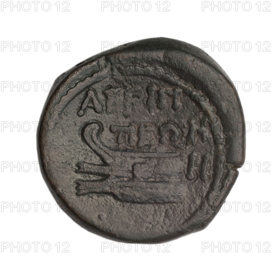 Bronze coin, prora (iconographic); obverse: head of a woman in a diadem and veil (Aphrodite Urania?) facing right, pearl-like rim; reverse: prora facing left, inscription above her in two rows, dot below her, H on the right, pearl-like rim; depiction includes balls, ships/vessels; bust/head of Aphrodite/Aphrodite Urania (iconographic); Black Sea, Cimmerian Bosporus, Phanagoria (as Agrippias); end 1st century BC; weight 8.80 g; axis 30°; dimensions 21.5 mm × 22.3 mm.