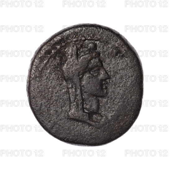 Bronze coin, Pantikapaion (as Kaisarea), end of the 1st century BC, Cimmerian Bosporus. Obverse: bust of a woman in a mural crown and a veil (Aphrodite Urania?) facing right, pearl rim. Reverse: torch vertically, inscription in two rows on both sides, letter H on the right, pearl rim. Subject: Aphrodite (Aphrodite Urania). Coin; weight 7.62 g; diameters 23.2 mm and 22 mm.