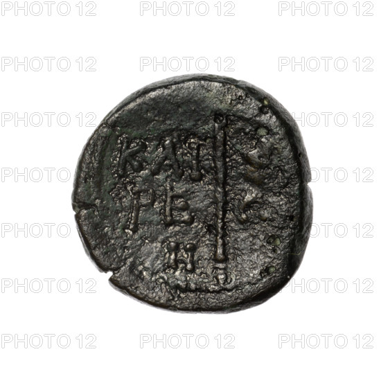 Bronze coin, Pantikapaion (as Kaisarea); obverse: woman's head in kalathos and veil (Aphrodite Urania?) facing right, pearl rim; reverse: scepter vertically, inscription in two rows on both sides, below on the left H, pearl rim. Iconography: woman's head, Aphrodite, Aphrodite Urania. Black Sea, Cimmerian Bosporus, end of the 1st century BC. Coin; weight 6.50 g; axis 30°; dimensions 21.5 mm × 21.2 mm.
