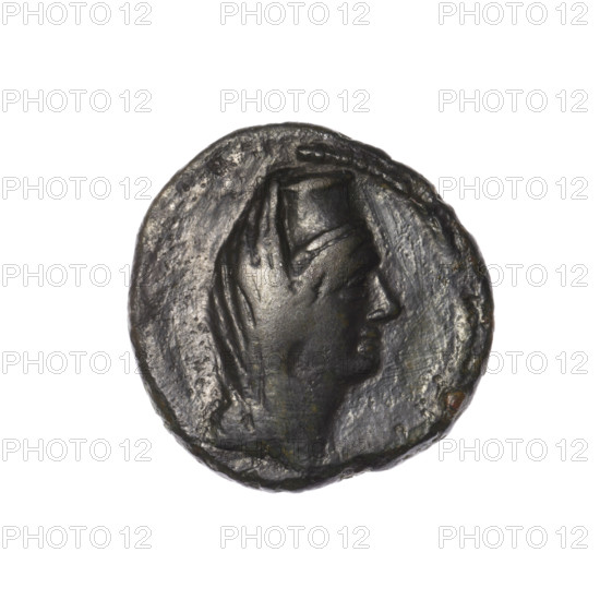 Bronze coin, Pantikapaion (as Kaisarea); obverse: head of a woman in a kalathos and a veil (Aphrodite Urania?) facing right, pearl-shaped rim; reverse: scepter vertically, inscription in two rows on both sides, dot on the top right, letter H at the bottom, pearl-shaped rim. Iconography: scepters, head of a woman in a kalathos and a veil, Aphrodite/Aphrodite Urania, balls. Black Sea (Cimmerian Bosporus), end of the 1st century BC. Coin; weight 5.15 g; axis 330°; dimensions 20.7 × 20.6 mm.