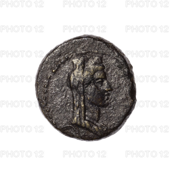 bronze coin, Pantikapaion (as Kaisarea); obverse: bust of a woman in a mural crown and a veil (Aphrodite Urania?), pearl rim; reverse: torch vertically, inscription in two rows on both sides, H on the right, pearl rim; busts of Aphrodite Urania; Aphrodite (mythology); Black Sea; end of the 1st century BC; Cimmerian Bosporus; Pantikapaion; coin; weight 6.78 g; dimensions 21.6 mm and 20.5 mm
