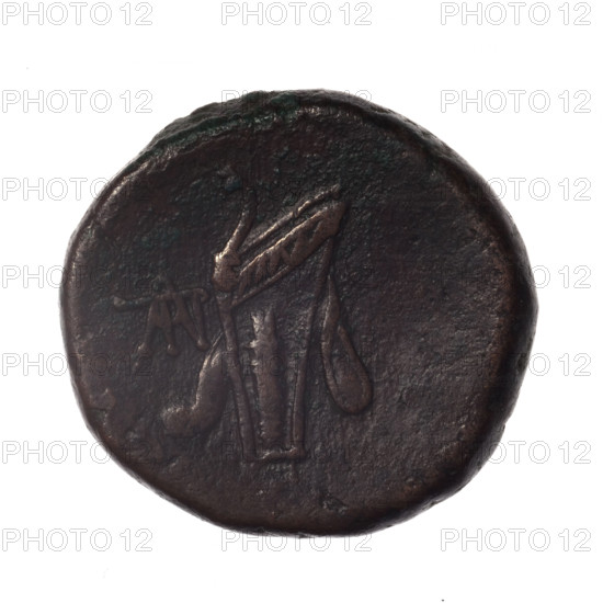 bronze coin, Pantikapaion; obverse: head of young Dionysus in an ivy wreath facing right; reverse: bow and arrows in a gorytos with straps, monogram on the left; iconography: bow in a quiver, head of Dionysus, quivers, gorytos, bows, weapons, armament; Dionysus (mythology); end of 2nd–ca. mid. 1st century BC (time of Mithridates VI Eupator, 120–63 BC); Cimmerian Bosporus; coin; weight 18.72 g; axis 330°; dimensions 25.3 × 26.6 mm; maker monograms.