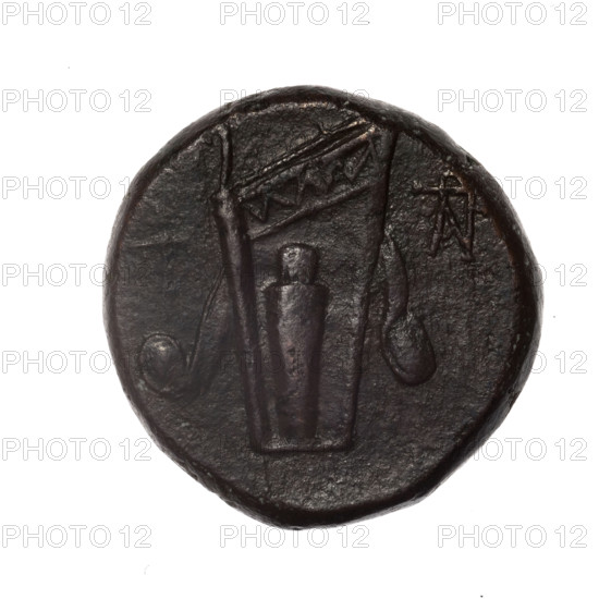 bronze coin, Pantikapaion; obv.: head of young Dionysus in an ivy wreath facing right; rv.: bow and arrows in a gorytos with straps, monogram on the right; iconography: bow in a quiver, head of Dionysus, gorytos, quivers, monograms, bows, weapons, armament; Dionysus (mythology); Black Sea; Cimmerian Bosporus, Pantikapaion; end of 2nd century?–half of 1st century BC (time of Mithridates VI Eupator, 120–63 BC); weight 17.84 g; dimensions 24.9 × 24.7 mm