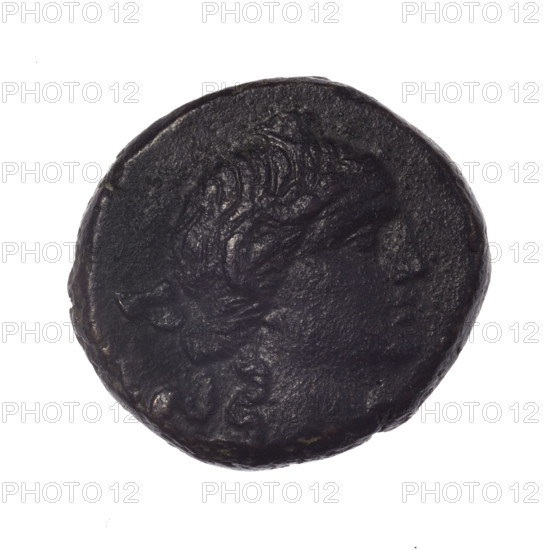 bronze coin, Pantikapaion; obverse: head of young Dionysus in an ivy wreath facing right; reverse: bow and arrows in a gorytos with straps, monogram on the left; iconography: bow in a quiver, head of Dionysus, quivers, gorytos, bows, weapons, armament; inscriptions/marks: monograms; period: end of 2nd–ca. mid. 1st century BC (time of Mithridates VI Eupator, Cimmerian Bosporus); weight 17.60 g; dimensions 24 mm × 26 mm; maker/attribution: Pantikapaion; subject: Dionysus (mythology).