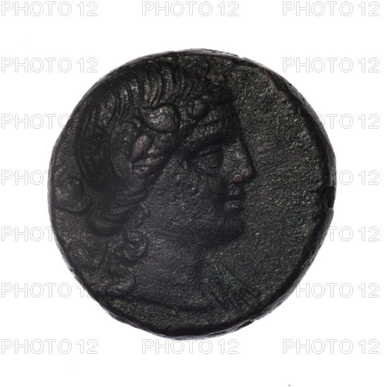 Bronze coin, Pantikapaion; obverse: head of young Dionysus in an ivy wreath facing right; reverse: bow and arrows in a gorytos with straps, monogram on the left. Iconography: bow in a quiver, head of Dionysus, gorytos, quivers, bows, weapons, armament. Inscriptions/marks: monograms. Date: end of 2nd–ca. mid-1st century BC (time of Mithridates VI Eupator, 120–63 BC). Place: Cimmerian Bosporus, Pantikapaion. Object type/material: coin, bronze. Weight: 18.01 g. Dimensions: 25.5 mm.