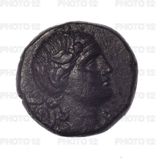 bronze coin, Pantikapaion; obverse: head of young Dionysus in an ivy wreath facing right; reverse: bow and arrows in a gorytos with straps, monogram on the left; iconography: bow in a quiver, head of Dionysus, quivers, gorytos, bows, weapons, armament; monograms; Dionysus (mythology); Black Sea region, Cimmerian Bosporus; dating: end of 2nd–ca. mid. 1st century BC (time of Mithridates VI Eupator, 120–63 BC); maker: Pantikapaion; metal: bronze; coin; weight 17.60 g; dimensions: 23.6 mm × 25.1 mm