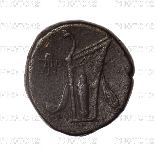 bronze coin, Pantikapaion; obv.: head of young Dionysus in ivy wreath facing right; reverse: bow and arrows in gorytos with straps, monogram on the left; iconography: bow in quiver, head of Dionysus, gorytos, quivers, weapons; monograms; Cimmerian Bosporus, Pantikapaion; dating: end of 2nd–ca. mid-19th c.; 1st century BC (time of Mithridates VI Eupator, 120–63 BC); weight 16.40 g; diameter approx. 24.1–25.2 mm