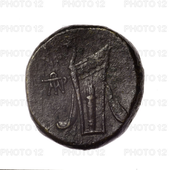 bronze coin, Pantikapaion; obv.: head of young Dionysus in an ivy wreath facing right; reverse: bow and arrows in a gorytos with straps, monogram on the left; iconography: bow in quiver, head of Dionysus, quivers (armed), gorytos (armed), bows, weapons, armament; Dionysus (mythology); Black Sea, Cimmerian Bosporus; end of 2nd–ca. mid. 1st century BC (time of Mithridates VI Eupator, 120–63 BC); weight 15.39 g; dimensions: 25.2 mm × 24.4 mm