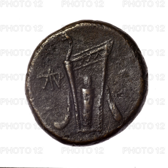 Bronze coin from Pantikapaion; obverse: head of young Dionysus in ivy wreath facing right; reverse: bow and arrows in a gorytos with straps, monogram on the left. Iconography: bow in quiver, gorytos, quivers, Dionysus, bows, weapons, armament. Date: end of 2nd–ca. mid 1st century BC (time of Mithridates VI Eupator, 120–63 BC). Region: Cimmerian Bosporus, Pantikapaion. Weight: 15.37 g. Dimensions: 25.3 mm × 25 mm.