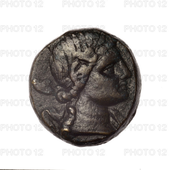 bronze coin, Pantikapaion; obv.: head of young Dionysus in an ivy wreath facing right; rv.: bow and arrows in a gorytos with straps, monogram on the left; iconography: bow in a quiver, head of Dionysus, gorytos, quivers, bows, weapons, armament; Dionysus (mythology); monograms; Black Sea, Cimmerian Bosporus, Pantikapaion; end of 2nd–ca. mid. 1st century BC (time of Mithridates VI Eupator, 120–63 BC); weight 15.26 g; axis 30°; dimensions 23 mm × 21.6 mm.