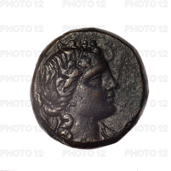 bronze coin, Pantikapaion; obverse: head of young Dionysus in an ivy wreath facing right; reverse: bow and arrows in a gorytos with straps, monogram on the left; iconography: Dionysus, bow in quiver, quivers, gorytos, bows, weapons, armament; end of 2nd–ca. mid. 1st century BC (time of Mithridates VI Eupator, Cimmerian Bosporus); coin; weight 14.80 g; dimensions 24.1 mm × 23.6 mm