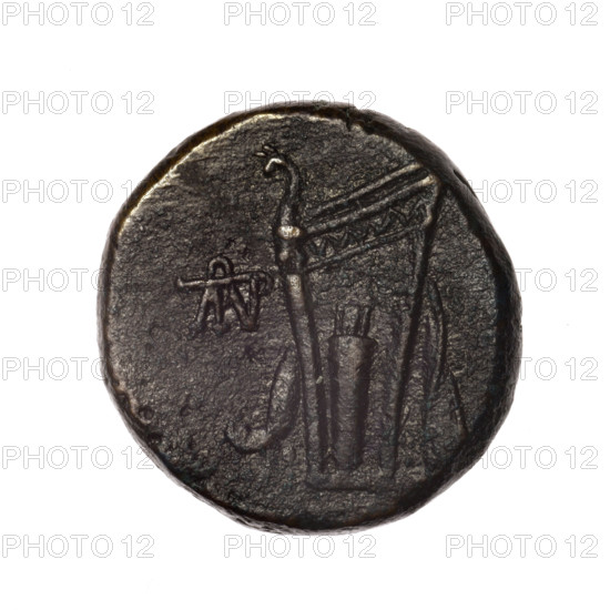 bronze coin, Pantikapaion; head of Dionysus (iconographic); bow in quiver (iconographic); monograms; quivers (armed); gorytos (armed); Black Sea; Dionysus (mythology); bows (armed); weapons (iconographic); armament (iconographic); obv.: head of young Dionysus in an ivy wreath facing right; rv.: bow and arrows in a gorytos with straps, monogram on the left; end of 2nd–ca. mid. 1st century BC (time of Mithridates VI Eupator, 120–63 BC); Cimmerian Bosporus; Pantikapaion; coin; weight 14.80 g; diameter ~24 mm