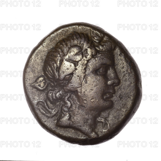 bronze coin, Pantikapaion; obverse: head of young Dionysus in an ivy wreath facing right; reverse: bow and arrows in a gorytos with straps, monogram on the left; iconography: bow in a quiver, quivers, gorytos, weapons, bows, armament; inscriptions/marks: monograms; Dionysus (mythology); Black Sea, Cimmerian Bosporus, Pantikapaion; date: end of 2nd – ca. mid. 1st century BC (time of Mithridates VI Eupator, 120–63 BC); weight 17.29 g; diameter ~25.5–25.6 mm
