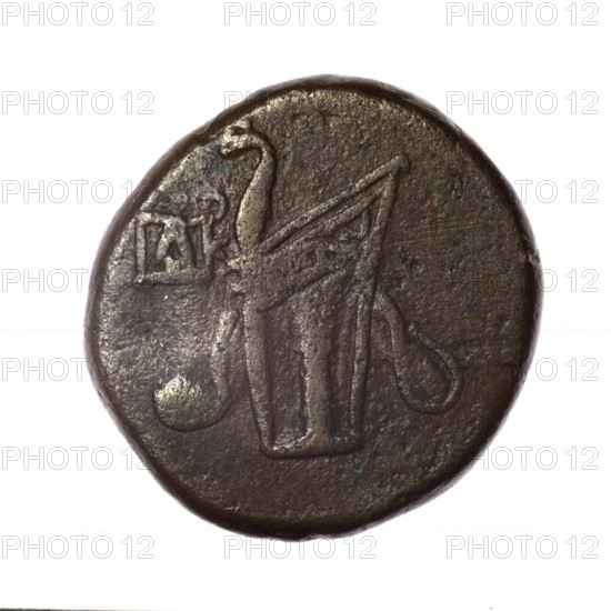bronze coin, Pantikapaion; obv.: head of young Dionysus in an ivy wreath facing right; reverse: bow and arrows in a gorytos with straps, monogram on the left; iconography: bow in a quiver, head of Dionysus, quivers, gorytos, bows, weapons, armament; inscriptions/marks: monograms; date: end of 2nd – ca. mid. 1st century BC (time of Mithridates VI Eupator, 120–63 BC); provenance/region: Cimmerian Bosporus, Pantikapaion; subject/mythology: Dionysus; material: bronze; coin; weight 17.29 g; dimensions: 25.5–25.6 mm