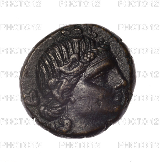 bronze coin, Pantikapaion; obverse: head of young Dionysus in an ivy wreath facing right; reverse: bow and arrows in a gorytos with straps, monogram on the left; iconography: bow in quiver, head of Dionysus, quivers, gorytos, bows, weapons, armament; Dionysus (mythology); end of 2nd–ca. mid. 1st century BC (time of Mithridates VI Eupator, Cimmerian Bosporus); coin; weight 14.70 g; axis 30°; dimensions 24.1 × 24.4 mm