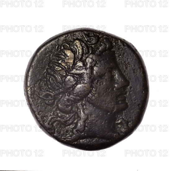 bronze coin, Pantikapaion; obverse: head of young Dionysus in an ivy wreath facing right; reverse: bow and arrows in a gorytos with straps, monogram on the left; iconography: bow in a quiver, head of Dionysus, quivers, gorytos, bows, weapons, armament; monograms; Dionysus (mythology); Black Sea, Cimmerian Bosporus, Pantikapaion; end of 2nd–ca. mid. 1st century BC (time of Mithridates VI Eupator, 120–63 BC); weight 15.00 g; diameter 24.5–24.8 mm