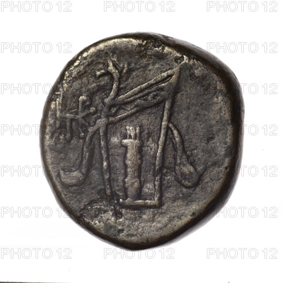 Bronze coin, Pantikapaion; obv.: head of young Dionysus in an ivy wreath facing right; rv.: bow and arrows in a gorytos with straps, monogram on the left; iconography: bow in a quiver, head of Dionysus, gorytos, quivers, bows, weapons, armament; inscriptions/marks: monograms; subject: Dionysus (mythology); date: end of 2nd – ca. mid. 1st century BC (time of Mithridates VI Eupator, 120–63 BC); findspot/region: Cimmerian Bosporus, Pantikapaion; material: bronze; type/function: coin; weight: 18.03 g; dimensions: 26.1 mm × 25.2 mm