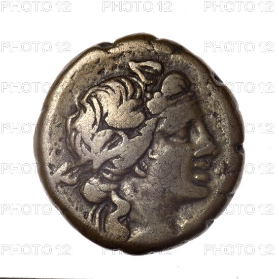 bronze coin, Pantikapaion; obverse: head of young Dionysus in an ivy wreath facing right; reverse: bow and arrows in a gorytos with straps, monogram on the left; iconography: bow in quiver, head of Dionysus, quivers (armed), gorytos (armed), bows, weapons, armament; inscriptions/marks: monograms; date: end of 2nd–ca. mid. 1st century BC (time of Mithridates VI Eupator, 120–63 BC); region: Cimmerian Bosporus, Pantikapaion; material: bronze; coin; weight 17.44 g; axis 30°; dimensions: 27.1 × 25.8 mm.