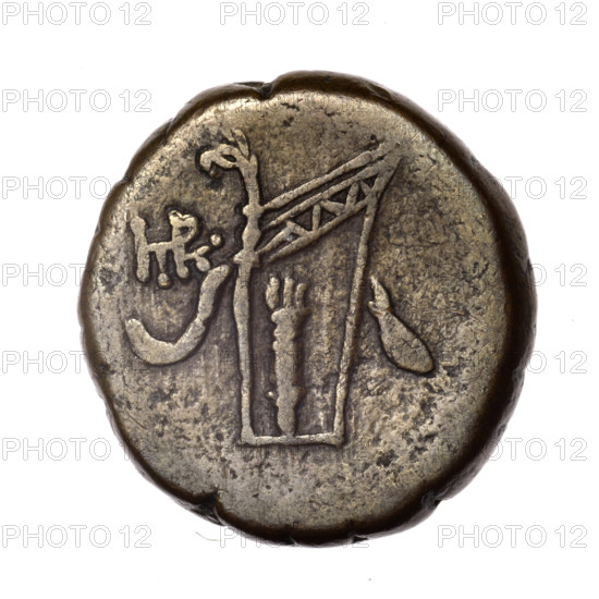 Bronze coin, Pantikapaion; obverse: head of young Dionysus in an ivy wreath facing right; reverse: bow and arrows in a gorytos with straps, monogram on the left; iconography: bow in quiver, head of Dionysus, quivers (armed), gorytos (armed), bows, weapons, armament; inscriptions/marks: monograms; date: end of 2nd–ca. mid. 1st century BC (time of Mithridates VI Eupator, 120–63 BC); region: Cimmerian Bosporus, Pantikapaion; material: bronze; function: coin; weight: 17.44 g; axis: 30°; dimensions: 27.1 × 25.8 mm.