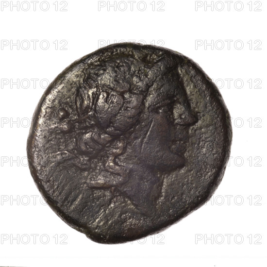 bronze coin from Pantikapaion; obverse: head of young Dionysus in an ivy wreath facing right; reverse: bow and arrows in a gorytos with straps, monogram on the left; iconography: bow in quiver, head of Dionysus, quivers, gorytos, bows, weapons, armament; inscriptions/marks: monograms; place/date: Cimmerian Bosporus, Pantikapaion, end of 2nd–ca. mid 1st century BC (time of Mithridates VI Eupator, 120–63 BC); physical: coin, weight 15.72 g, axis 30°, diameters 25.7 mm × 26 mm