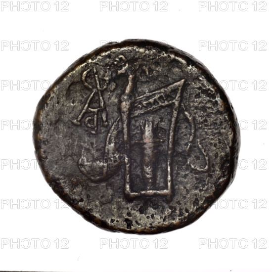 bronze coin, Pantikapaion; obverse: head of young Dionysus in an ivy wreath facing right; reverse: bow and arrows in a gorytos with straps, monogram on the left; iconography: bow in a quiver, head of Dionysus, gorytos, quivers, monograms, bows, weapons, armament; date: end of 2nd — ca. mid. 1st century BC (time of Mithridates VI Eupator, 120–63 BC); region: Cimmerian Bosporus, Pantikapaion; weight 15.18 g; dimensions 24.4 mm × 26.2 mm; maker/attribution: Pantikapaion.