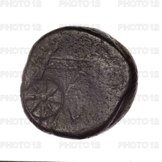 Bronze coin from Pantikapaion, end of 2nd–ca. mid 1st century BC (time of Mithridates VI Eupator, 120–63 BC), Cimmerian Bosporus. Obverse: head of young Dionysus in ivy wreath facing right, with countermark (eight-pointed star). Reverse: bow and arrows in gorytos with straps, monogram, countermark (star) on the left. Iconography: bow in quiver, head of Dionysus, gorytos, quivers, bows, weapons, armament; also countermarks, monograms, stars. Coin weight 16.97 g; diameters 24.2–24.3 mm.