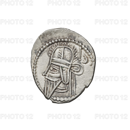 drachma, Vologases V (191–208). Obv.: head of Vologases V in tiara, king facing left. Rev.: Arsakes seated on a throne, bow in hand, facing right, below the arch – monogram. 191–208, Parthia, Ecbatana, Iran. Coin, weight 3.90 g. Subjects: helmets, heads, bows (armed).
