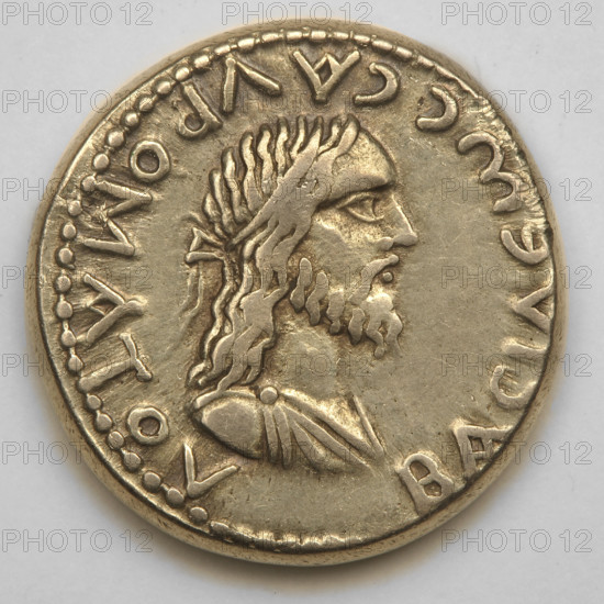 Electron stater, Sauromates II (172–211). Obverse: bust of Sauromates II in diadem and drapery facing right; border of pearls. Reverse: head of Septimius Severus in laurel wreath facing right, opposite bust of Caracalla in laurel wreath and drapery facing left; between them a trident; inscription at bottom reading (498 AD Pontic Era = 201 AD). Cimmerian Bosporus; Black Sea Bosporan state. Portraits of rulers. Coin; weight 7.68 g; diameter ~18.5 mm (18.3–18.5 mm). Materials: electrum. Icons: trident attribute. Makers/dates: Sauromates II (ruler of the Bosporus, d. 211); Septimius Severus (Roman emperor, 146–211); Caracalla (Roman emperor, 188–217).